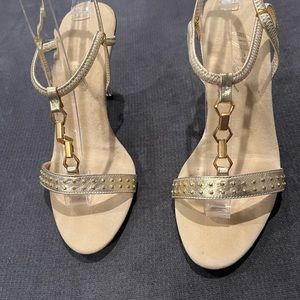 Onex heels. Great for parties. Wore once. Gold tone with clear 3.5 “ heels.
